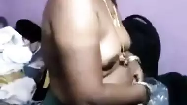 very shy indian aunty stripping infront of...