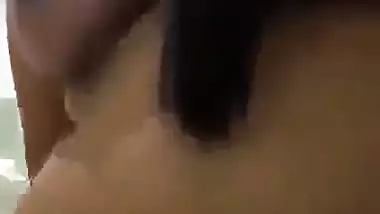 Tamil porn of a girl riding after putting a condom on a dick