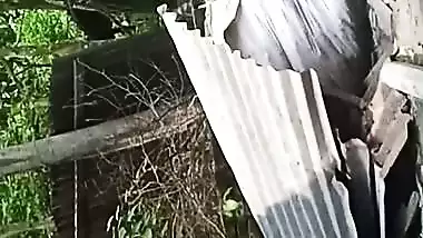 Village neighbor girl outdoor bath caught through hole