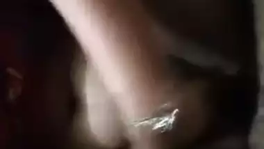 Slinky Desi slut takes her XXX coconuts out and licks sex nipple